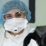 Doctor in mask and glasses